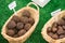 Labeled Baskets of Black Walnuts and Chestnuts