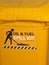 Labeled bright yellow industrial emergency spill kit