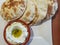 Labneh cream cheese dip with bread; Lebanese food