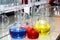 Laboratory beakers with the coloured liquid