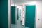 Laboratory corridor with green doors and measuring sensors