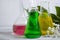 Laboratory flask  botany   perfumery  aroma  technology  cosmetology science  biotechnology on a light background extraction