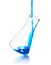 In laboratory flask pours blue reagent