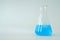 Laboratory glass Erlenmeyer conical flask filled