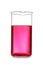 Laboratory glassware with color sample on white background.