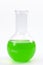 Laboratory glassware, scientific experiment and chemistry lab conceptual idea with round-bottom flask containing green liquid