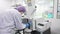 A laboratory worker prepares equipment for the study