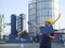 Laborer outside a factory working dressed with safety overalls equipment