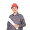 Laborer in red hard hat holding drawings in hand standing in front of white background