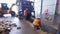 Laborers sorting trash, garbage at a recycling plant conveyor.