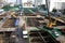 Laborers work at the construction site of a building.