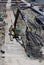 Laborers work at the construction site of a building.