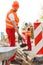 Labourer in orange safety helmet