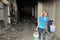 Labourer at work in a fire gutted mall in Bangkok