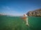 Labrador dog swimming with a frisbee Curacao views