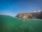 Labrador dog swimming with a frisbee Curacao views