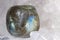 Labradorite laid on druze of quartz