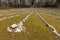 Labyrinth made of white stones on a green meadow near Beli on a sunny day in spring