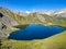 Lac de Fenetre in Valais in Val Ferret valley and near the Great St. Bernhard. Nice view over the lake to the mountains