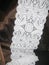 Lace background from a white strip