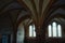 Lacock, England - March 01 2020: Shot of of dark, spooky room in the cloisters at Lacock Abbey