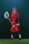 Lacrosse Player, athlete sportsman in red helmet on dark background. Sport and motivation wallpaper.