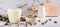 Lactose-free pistachio milk in a glass and nuts on the table web banner