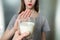 Lactose intolerance. Dairy Intolerant young girl refuses to drink milk