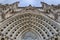 Lacy decoration of cathedral entrance in details in Barcelona, Spain