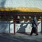 A Ladakhi buddhist takes a walk around the temple