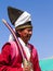 Ladakhi man in traditional clothing with ritual sword