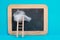 Ladder with a cloud on top, blank chalkboard, blue colored background, copy space, dreaming of success, creative and business