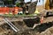 Ladder reaches out of a trench on a street repair