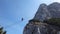 Ladder between two rock mountains on via ferrata Donnerkoge lin Austrian Alps