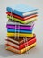 Ladders and heap of colorful books. 3D illustration