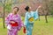 Ladies holding hands under the cherry tree