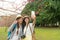 Ladies takes selfies under the cherry tree