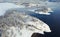 Ladoga Skerries, in winter in Karelia Russia Small  .stone islands in the snow on Lake Ladoga