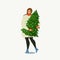 Lady Carrying a Christmas Tree. Merry Christmas and Happy New Year. People are preparing for the new year.