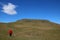 Lady fellwalker on slopes of Hallin Fell, Cumbria