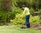 Lady gardener throws away fork in frustration