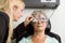 Lady having eye test examination