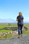 Lady hiker admiring the view, in Ribblesdale, North Yorkshire, England.