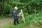 Lady Hiker reading a Map on a Footpath