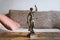 Lady justice or justitia statue on table - landlord and tenant law