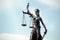 Lady justice, themis, statue of justice on sky background