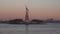 Lady Liberty statue on island full in New York Hudson River