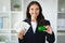 Lady manager hold lot of dollars cash and credit card