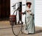 Lady And Penny Farthing Bicycle