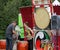 Lady playing drums at festival